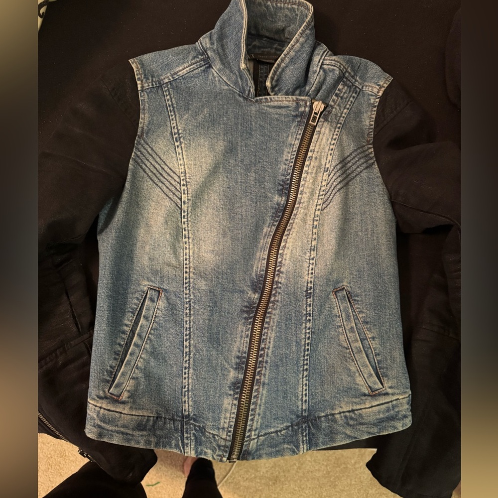 Size small. Jean jacket, black sleeve detailing